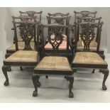 A set of ten late 19th century Chippendale style mahogany dining chairs,