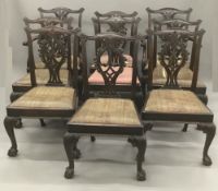 A set of ten late 19th century Chippendale style mahogany dining chairs,