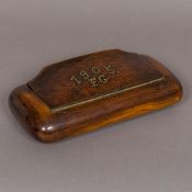 A large treen table snuff box Of hinged rounded rectangular form, the lid pique inlaid 1905 FG.