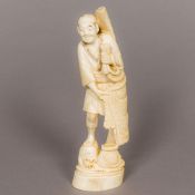 A 19th century Japanese ivory okimono Formed as a fisherman carrying his net. 26.5 cm high.