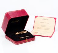 An 18 ct yellow gold diamond set Cartier 'Love' bracelet Of typical form,