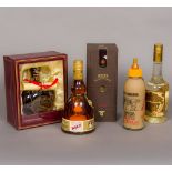 Five bottles of various alcohol Including: a boxed Bell's 21 Years Old Royal Reserve Very Rare