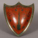A 19th century Indian copper shield The red and blue enamel ground with scrolling foliate
