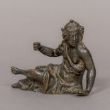A 17th century patinated bronze figure Modelled crouching, wearing a headdress,