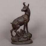 A carved wooden Black Forest mountain goat Naturalistically modelled on a rocky outcrop. 44.
