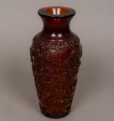 A Peking cameo glass vase Of amber colour decorated in the round with numerous dragons. 25.