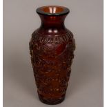 A Peking cameo glass vase Of amber colour decorated in the round with numerous dragons. 25.