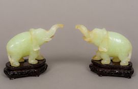 A pair of Chinese carved jade elephants Each naturalistically modelled,