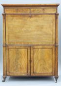 A 19th century mahogany library secretaire The rectangular top above the twin frieze drawers over