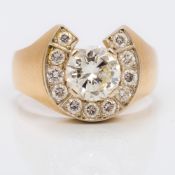 A gentleman's 14K gold diamond set horseshoe ring The central round brilliant cut diamond