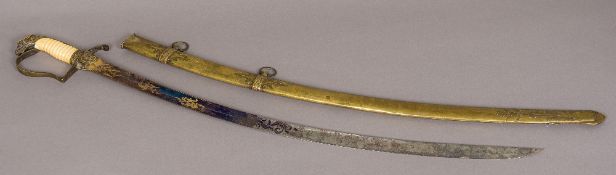 A 19th century bone handled sabre The handle with eagle terminal above the blued and gilt engraved