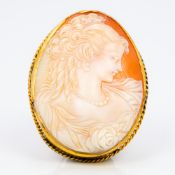 A 19th century unmarked gold mounted cameo brooch Carved with a bust of a young maiden. 5.