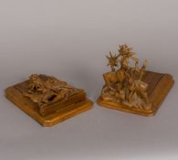 A late 19th century Black Forest carved wooden book slide The ends each carved as a pair of