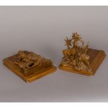A late 19th century Black Forest carved wooden book slide The ends each carved as a pair of