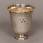 Two antique Continental silver beakers Each of flared form, standing on a stepped foot,