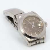 A stainless steel cased lady's Rolex wristwatch The black dial with batons and date aperture