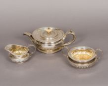A George III/George IV matched four piece silver tea set, teapot hallmarked London 1818,