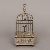 A Continental 925 silver automaton singing bird box Formed as a bird cage enclosing two birds. 22.