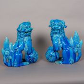 A large pair of 19th century Chinese porcelain dogs-of-fo Each typically modelled with one front