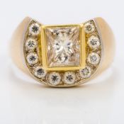 An unmarked gold gentleman's gold diamond set horseshoe ring The central princess cut stone