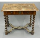 An 18th century walnut side table The moulded feather banded quarter veneered rounded rectangular