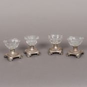 A set of four 19th century Continental cut clear glass mounted silver table salts Each cut glass
