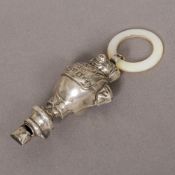 A George V silver baby's rattle/whistle, hallmarked Birmingham 1911,