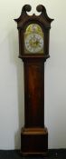 An 18th century mahogany cased longcase clock The rosette carved arched broken swan-neck pediment