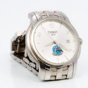 A Tissot stainless steel gentleman's wristwatch The silvered dial with Arabic numerals,