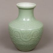 A Chinese celadon porcelain vase, possibly 18th century Of flared ovoid form,