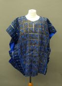 A blue and black with gold thread tunic top With single covered button.