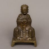 A bronze figure of Buddha Modelled seated in flowing robes. 22 cm high.