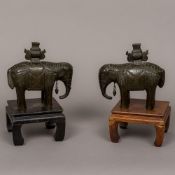 A pair of 19th century Chinese patinated bronze elephant form censers Each typically modelled