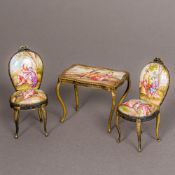 A 19th century Vienna enamel suite of miniature furniture Comprising: a table and a pair of chairs,