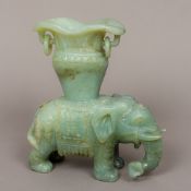 A Chinese carved jade censer Formed as an elephant, the vase on its back. 22.5 cm high.