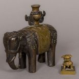 A 19th century Tibetan patinated bronze incense burner Formed as an elephant with twin handled
