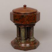 A 19th century serpentine stone font The lidded octagonal top above five columns,