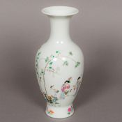 A Chinese Republic period porcelain vase Finely painted with female figures and deer and crane in a