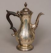 A George II silver coffee pot, probably hallmarked for London 1775,