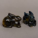 A Chinese carved tigers eye rabbit Modelled on all fours;