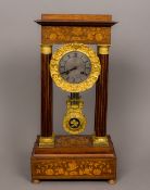 A 19th century marquetry inlaid rosewood portico clock Of typical form,
