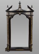 A 19th century Milanese ivory inlaid ebonised pier glass The finial mounted broken arched pediment