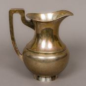 A late 19th/early 20th century Chinese silver jug With angular loop handle,