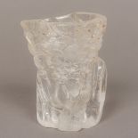 A Chinese carved rock crystal libation cup Typically modelled with organic decoration. 10.