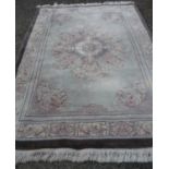 Large Chinese woollen blue ground rug (width 180cm)