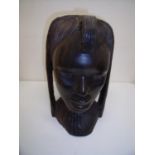 Large carved African hardwood figure of a woman's head (28cm high)