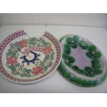 Victorian Majolica oval bread plate with floral pattern and another charger (A/F) (2)