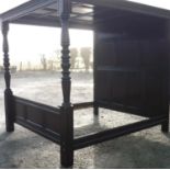 Quality reproduction oak panelled four poster bedstead