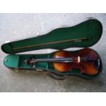 Cased unnamed violin with bow