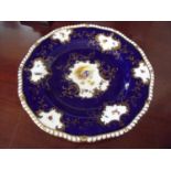 Coalport blue & gilt cabinet plate with central panel of a bird within blue background, the plate